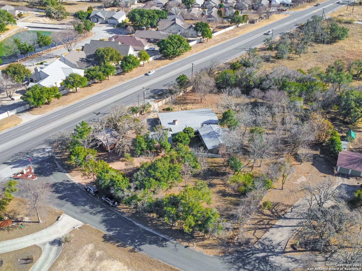 142 Royal Oaks Road Kerrville, TX 78028 - Photo 10 of 17 a view of a garden with a pathway