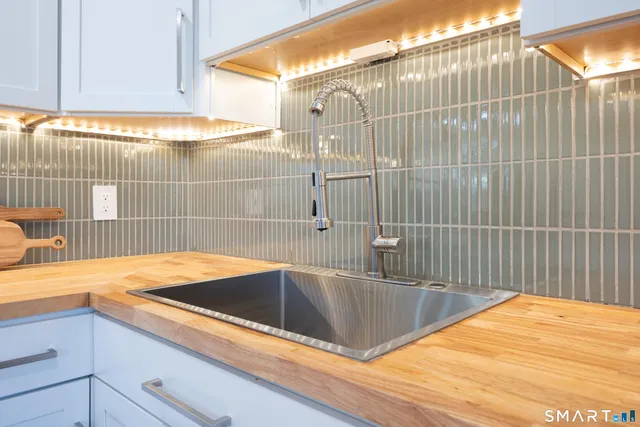 a bathroom with a sink and a bathtub