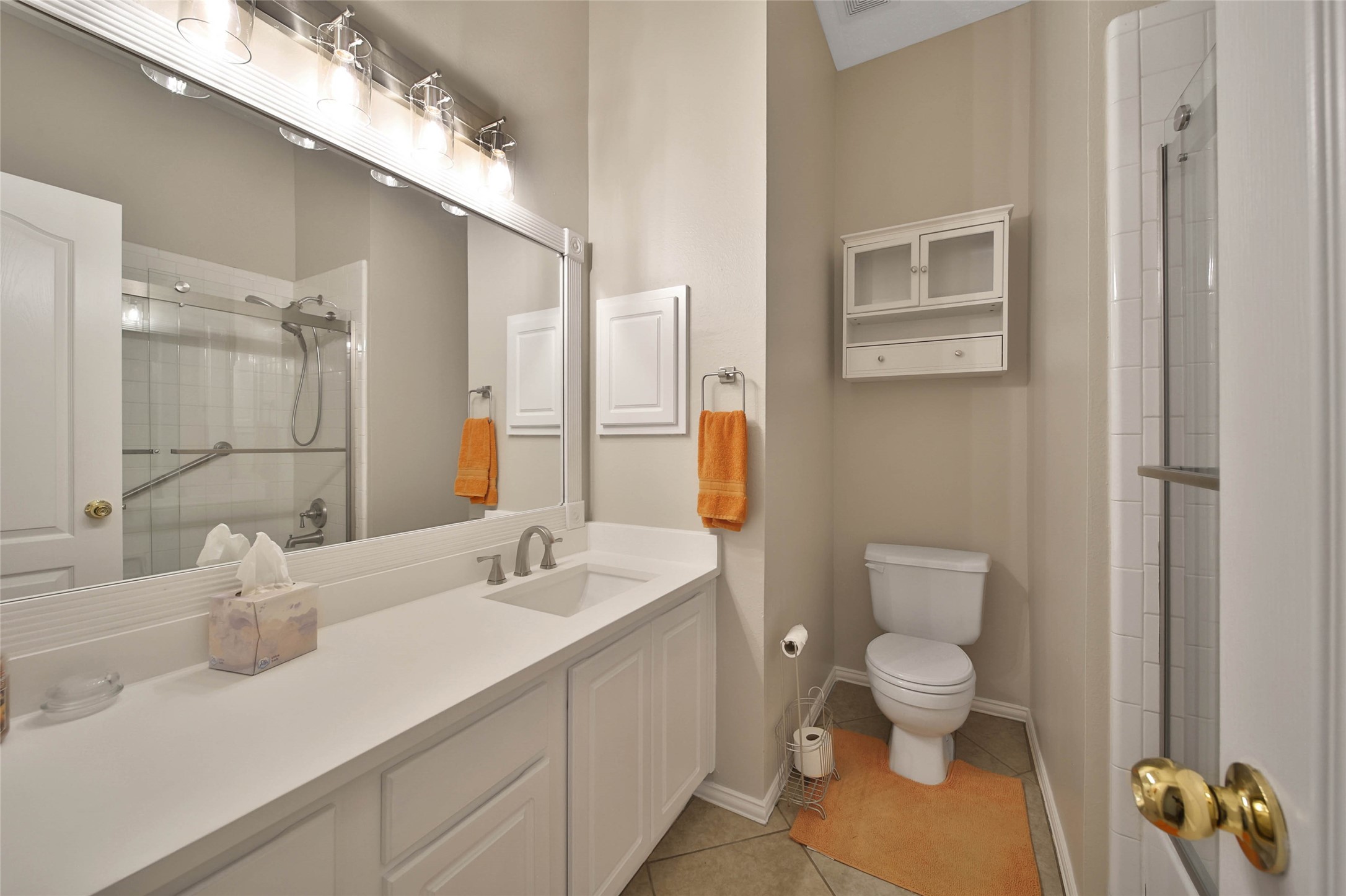 21338 Timber Pines Drive Spring, TX 77388 - Photo 23 of 29 a bathroom with a toilet sink and mirror