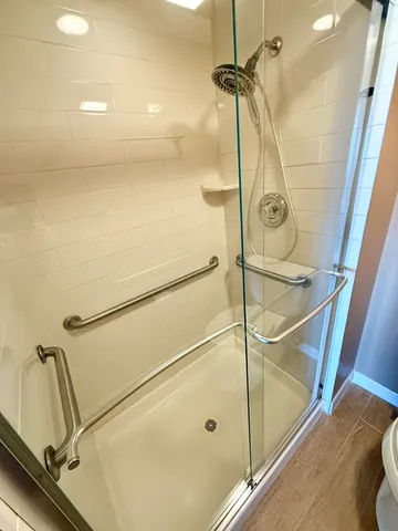 an empty room with wooden floor