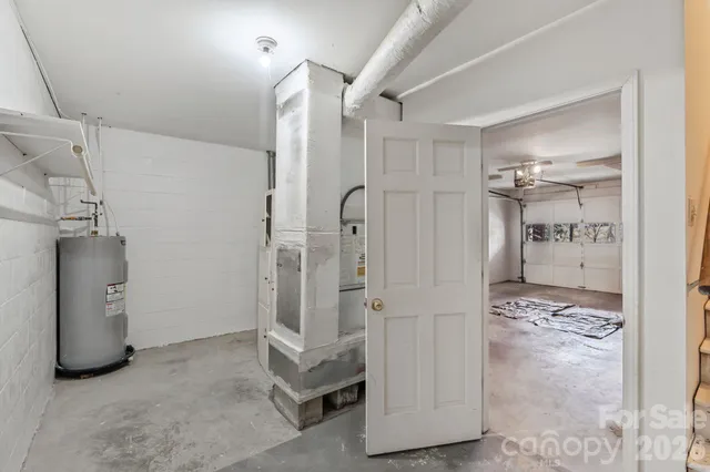 a bathroom with a shower and a glass door