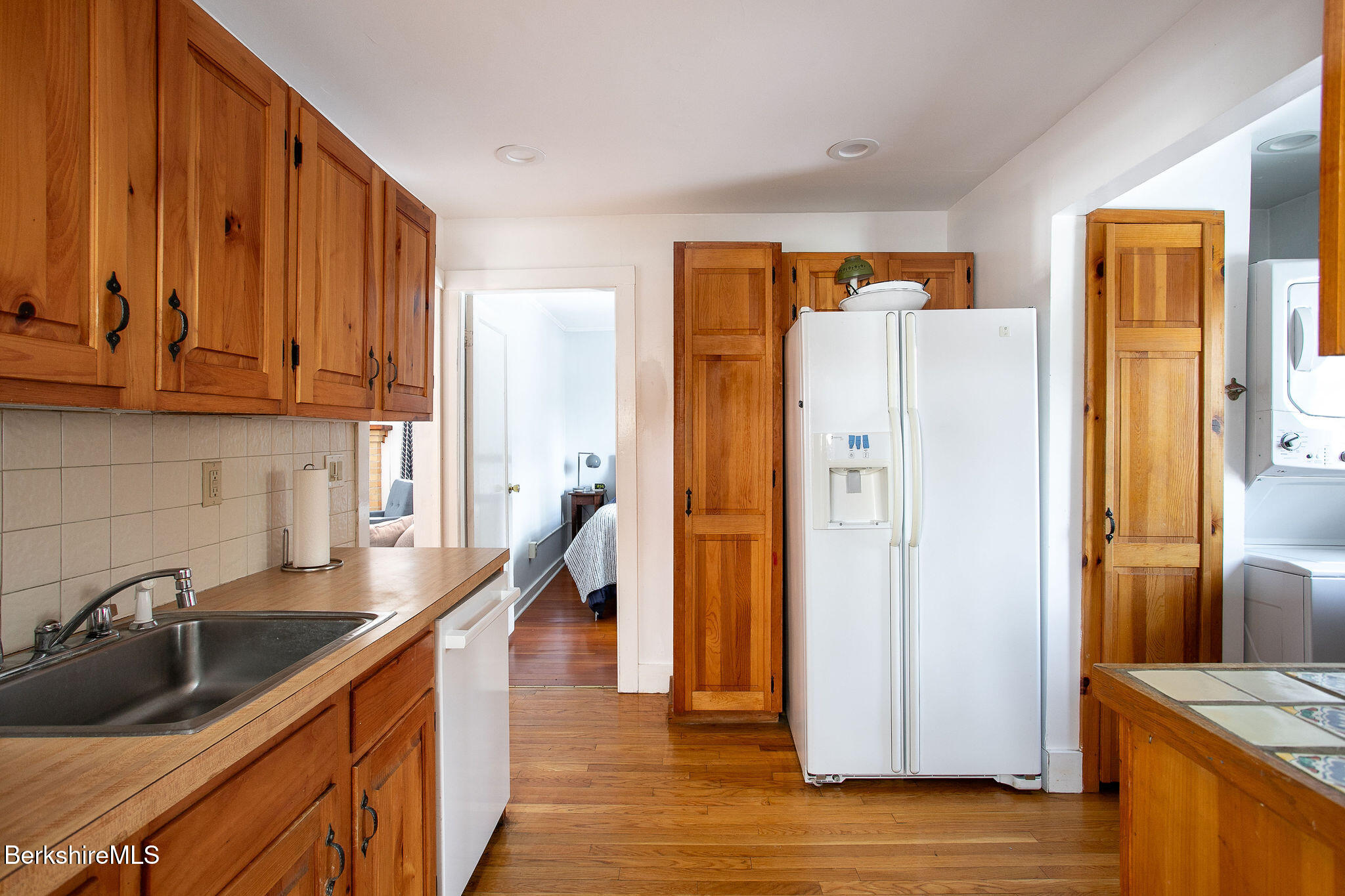 10 Elm Road Richmond, MA 01201 - Photo 14 of 32 a kitchen with stainless steel appliances granite countertop a refrigerator and a sink