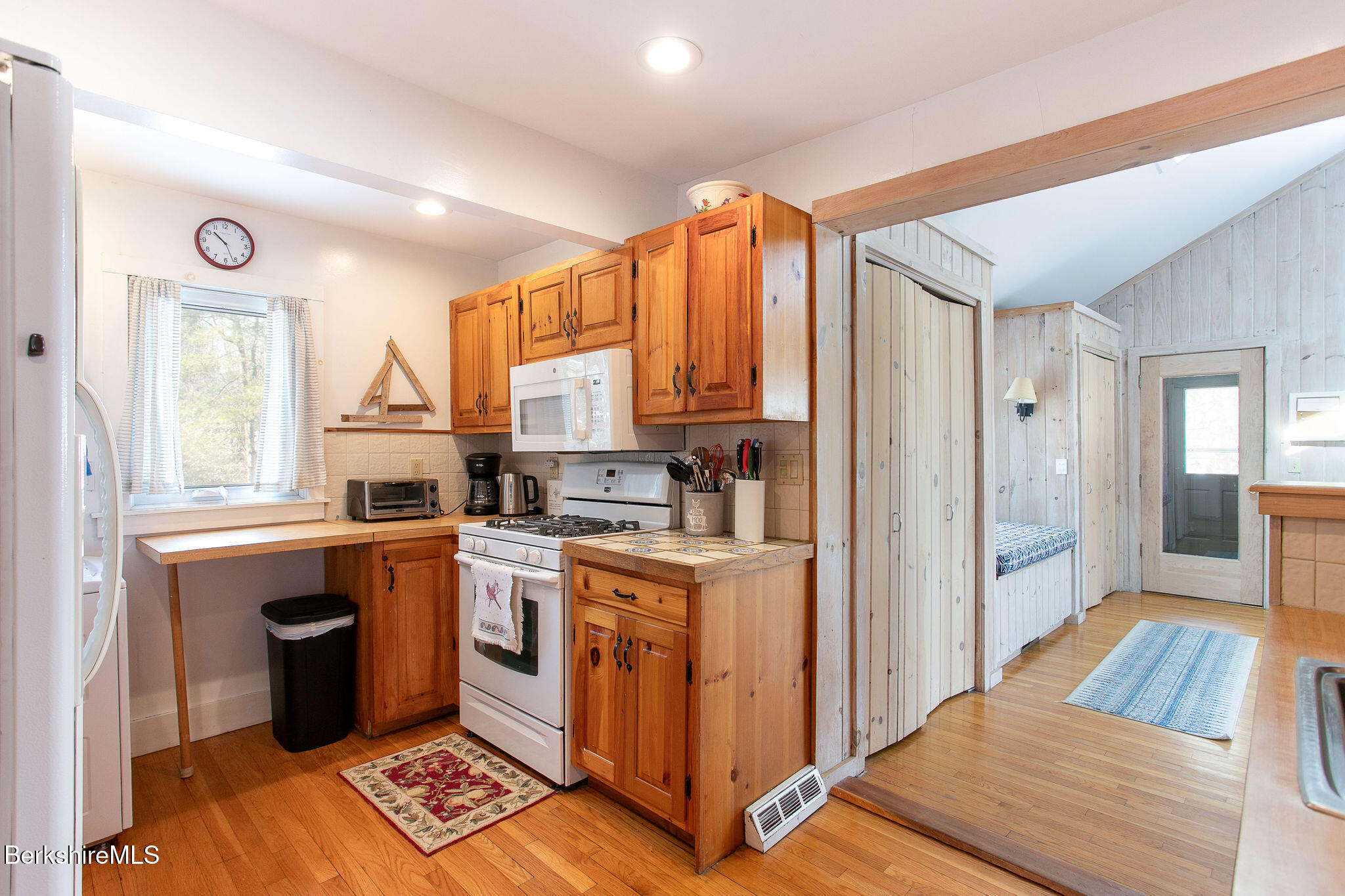 10 Elm Road Richmond, MA 01201 - Photo 15 of 32 a kitchen with a stove a sink and a refrigerator