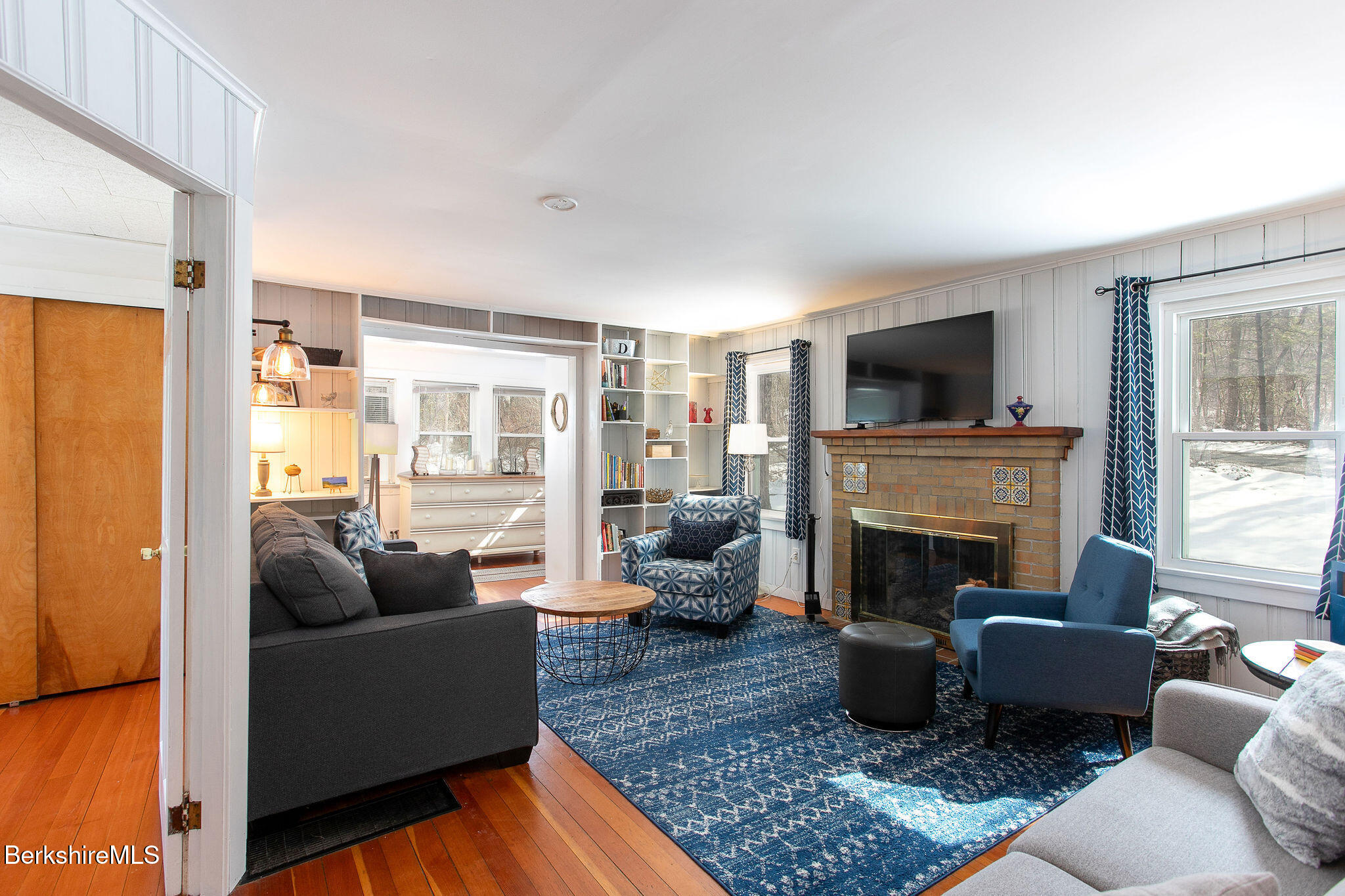 10 Elm Road Richmond, MA 01201 - Photo 19 of 32 a living room with furniture and a fireplace