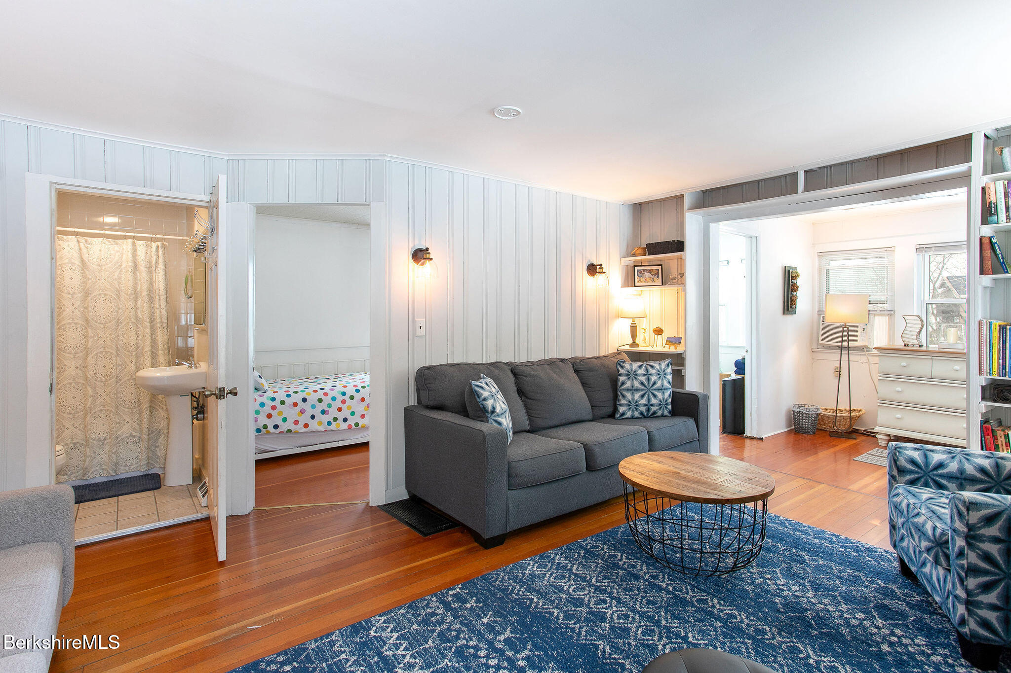 10 Elm Road Richmond, MA 01201 - Photo 23 of 32 a living room with furniture and a gate