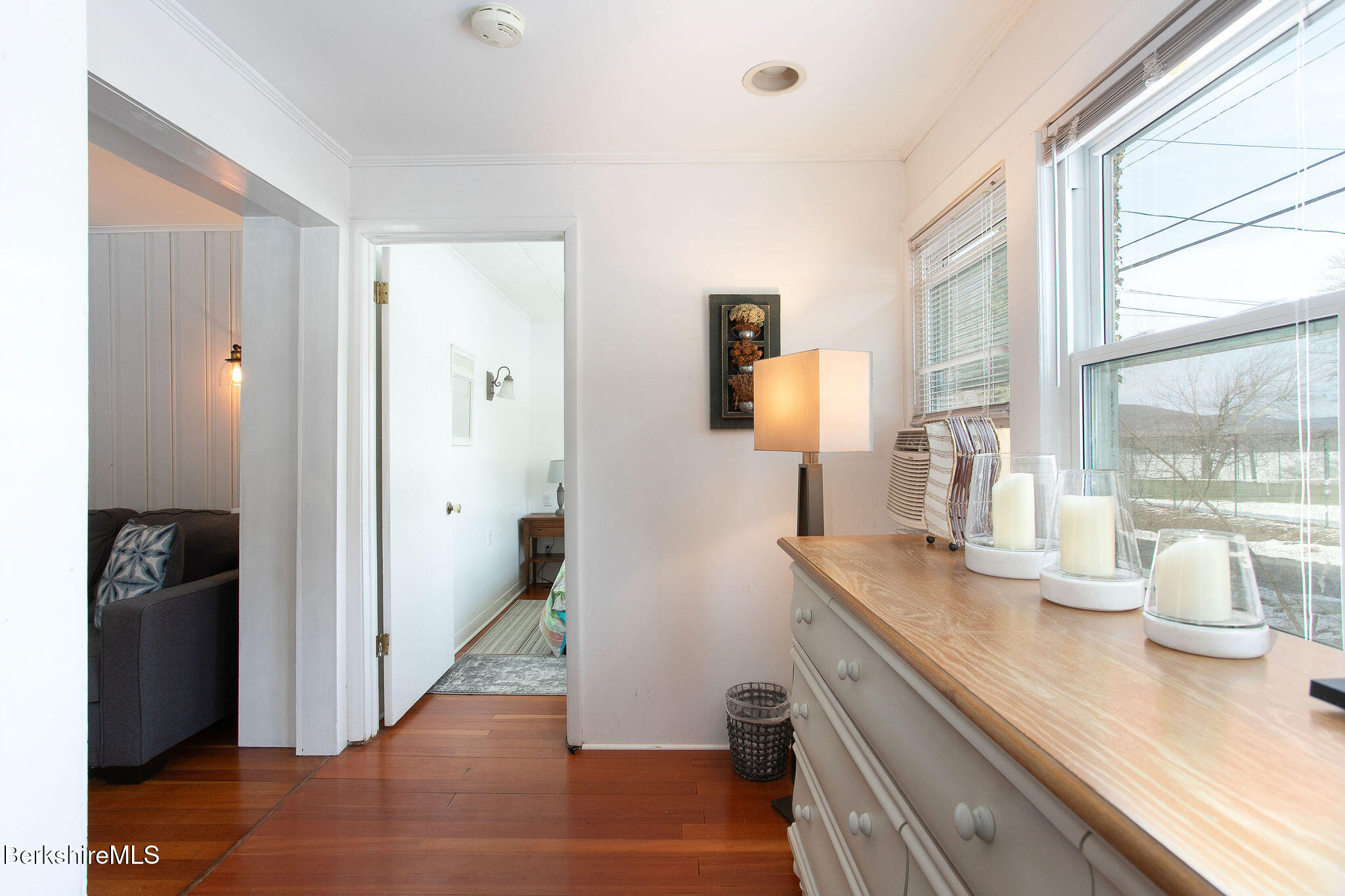 10 Elm Road Richmond, MA 01201 - Photo 27 of 32 a hallway with sink and a large mirror