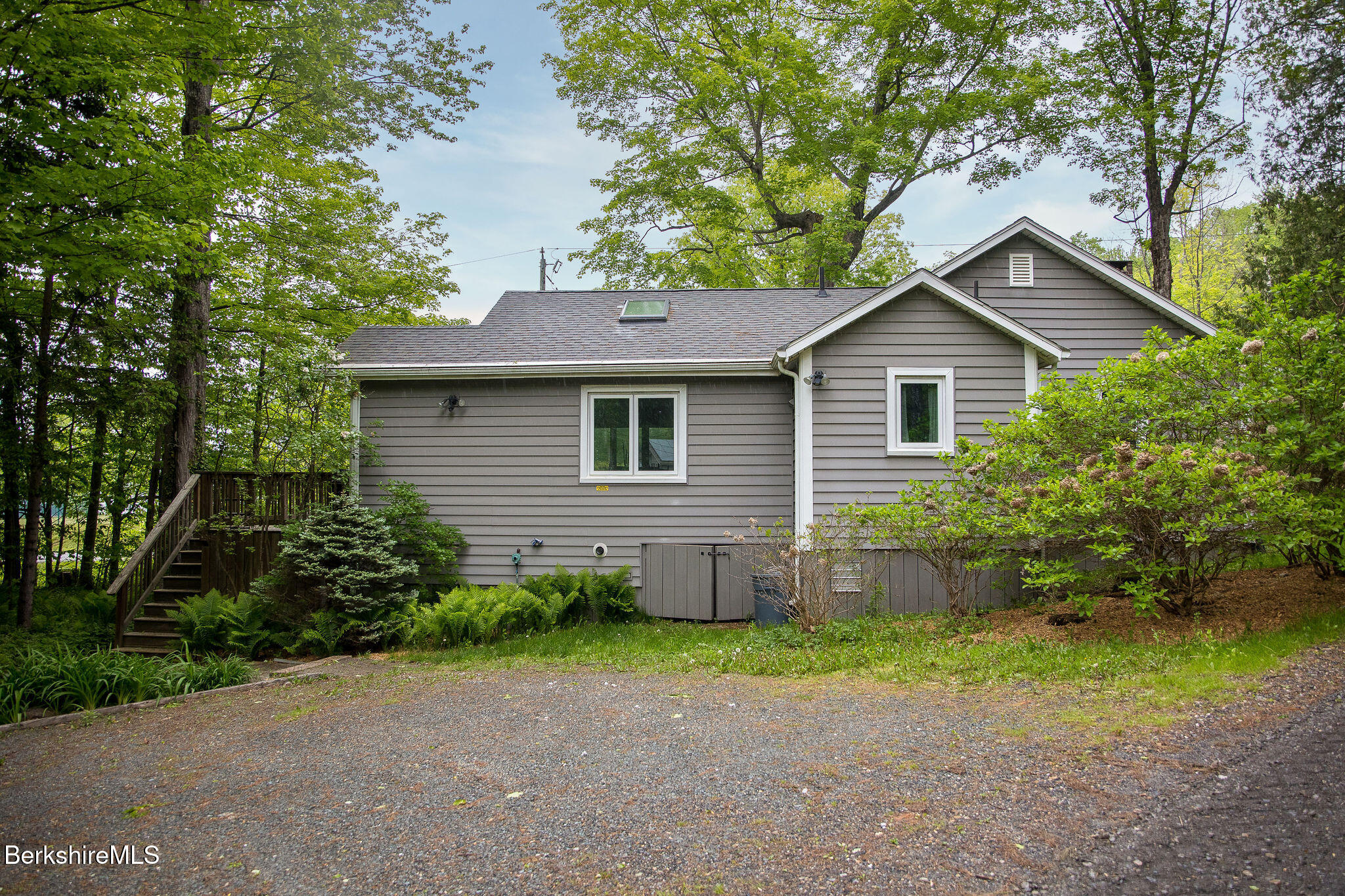 10 Elm Road Richmond, MA 01201 - Photo 3 of 32 a front view of a house with garden
