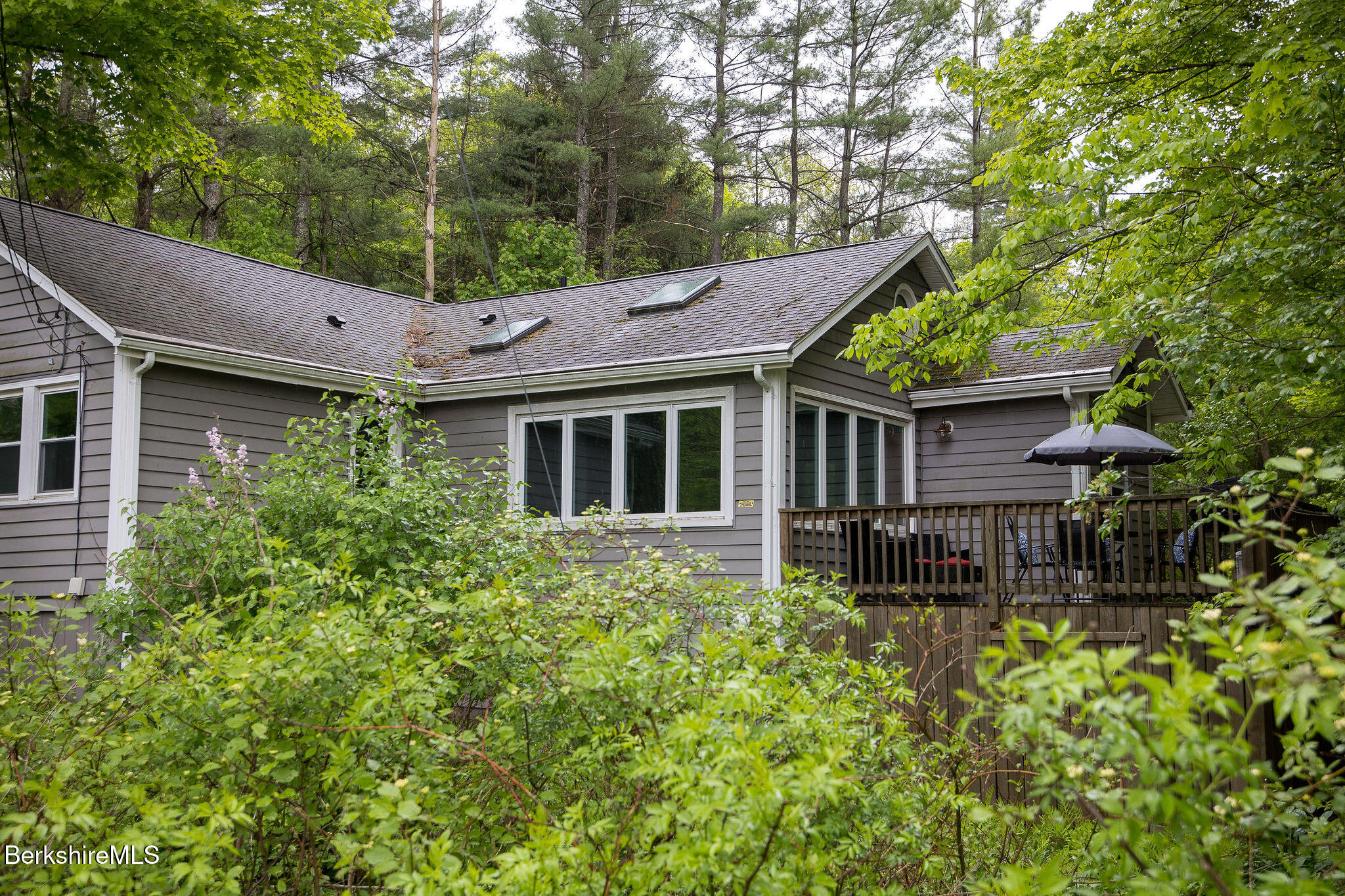10 Elm Road Richmond, MA 01201 - Photo 5 of 32 a house view with a garden space