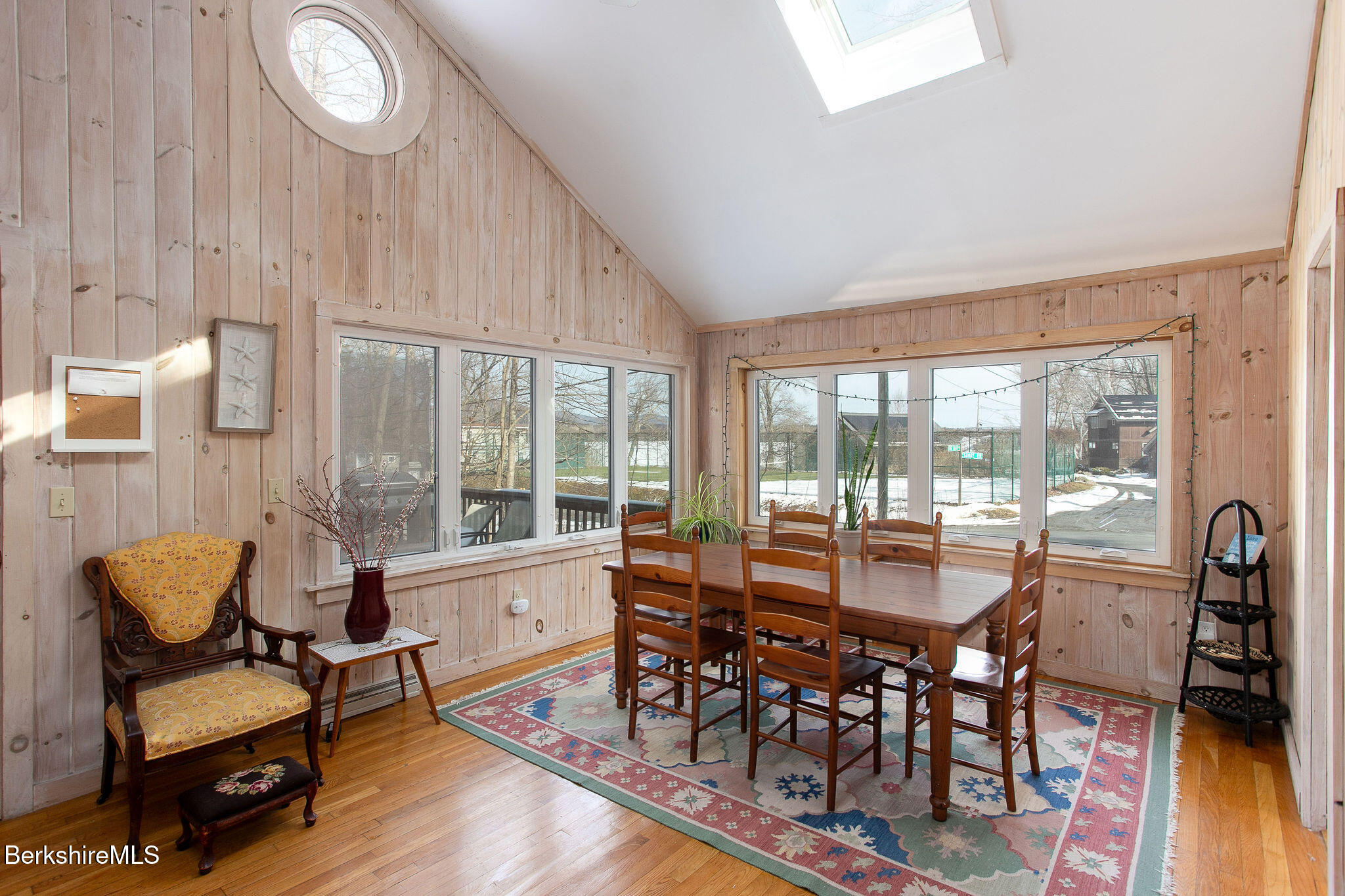 10 Elm Road Richmond, MA 01201 - Photo 10 of 32 a dining room with furniture a chandelier and wooden floor