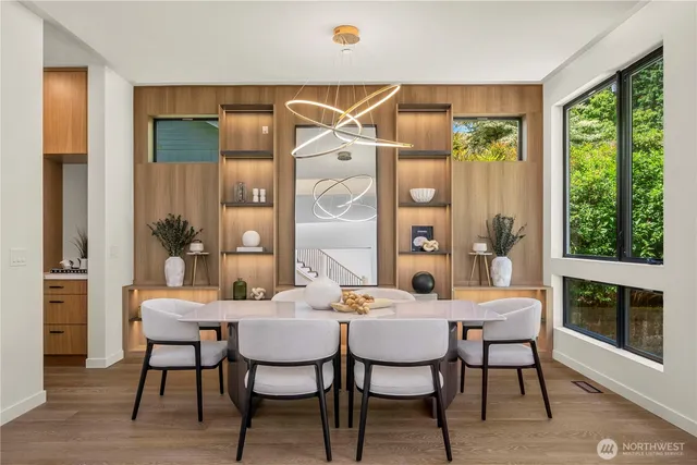 a dining room with furniture and window