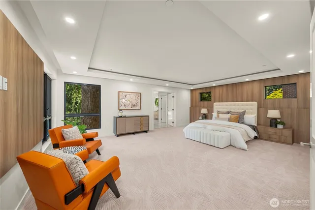 a spacious bedroom with a bed and window