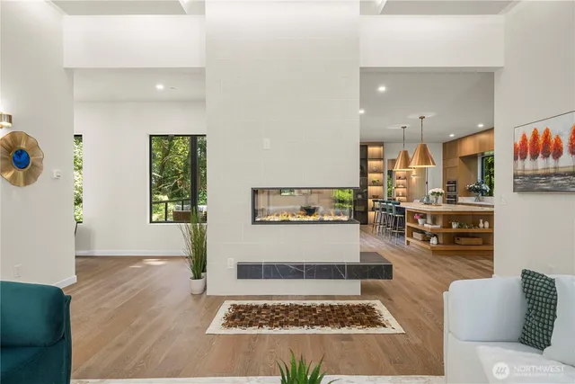 a living room with furniture and a rug