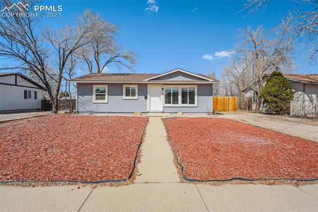 1216 Harrison Road Colorado Springs, CO 80905 - Photo 14 of 15 Front exterior w/off street parking. Plenty of room to build a garage or carport!