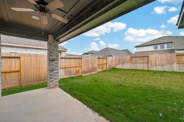 a view of a backyard with garden