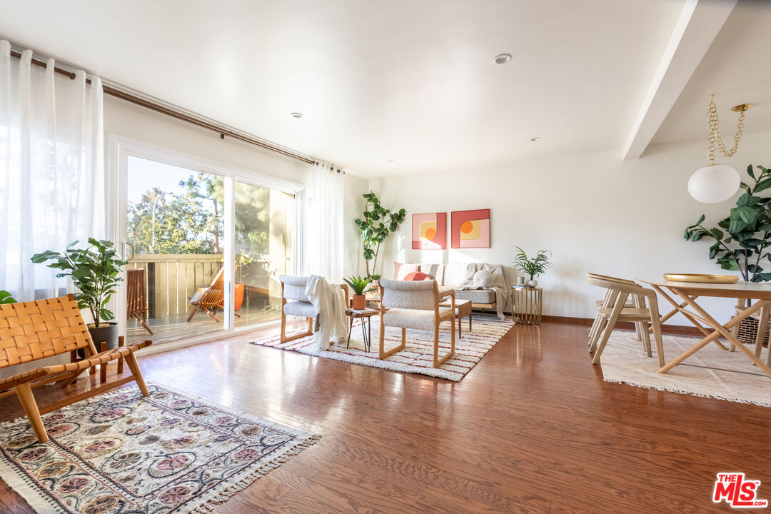 4804 Hollow Corner Road, Unit 125 Culver City, CA 90230 - Photo 1 of 43 a living room with furniture and wooden floor
