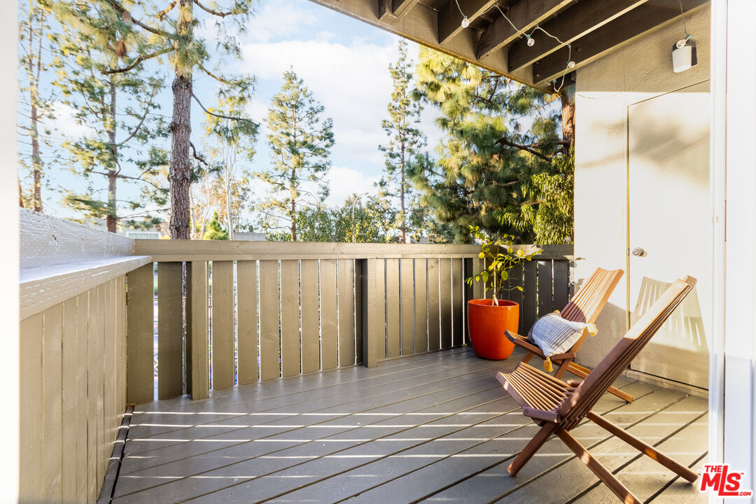 4804 Hollow Corner Road, Unit 125 Culver City, CA 90230 - Photo 3 of 43 a view of a porch with furniture and a yard