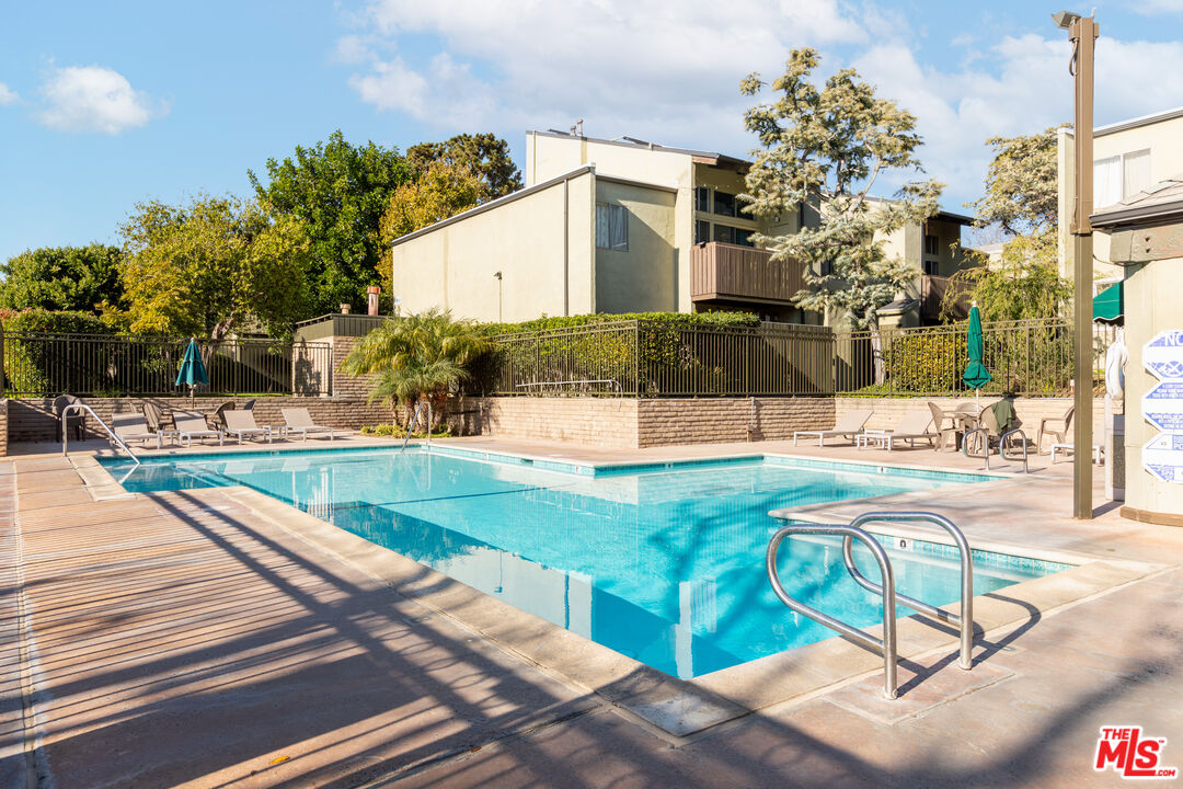 4804 Hollow Corner Road, Unit 125 Culver City, CA 90230 - Photo 34 of 43 a view of a swimming pool with a patio