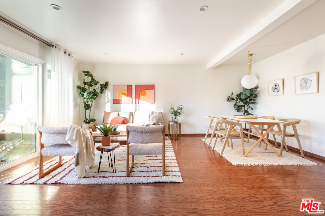 4804 Hollow Corner Road, Unit 125 Culver City, CA 90230 - Photo 9 of 43 a living room with furniture and a table