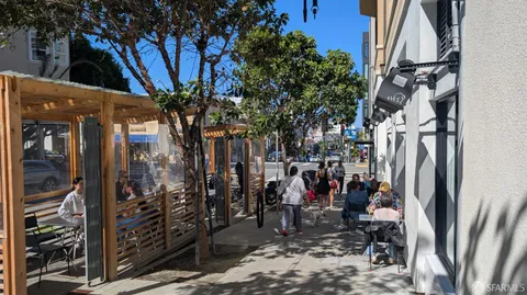 a view of path along with retail shop