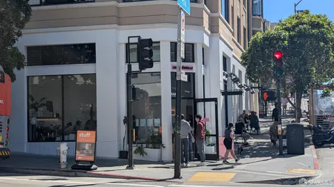 a front view of a building with street view