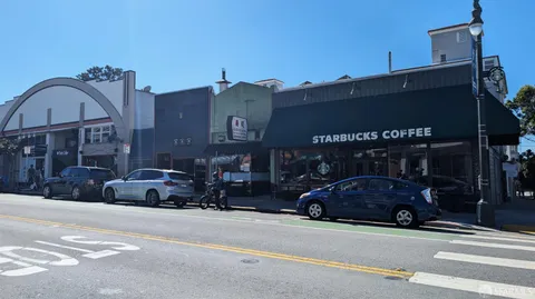 a car parked in front of a building