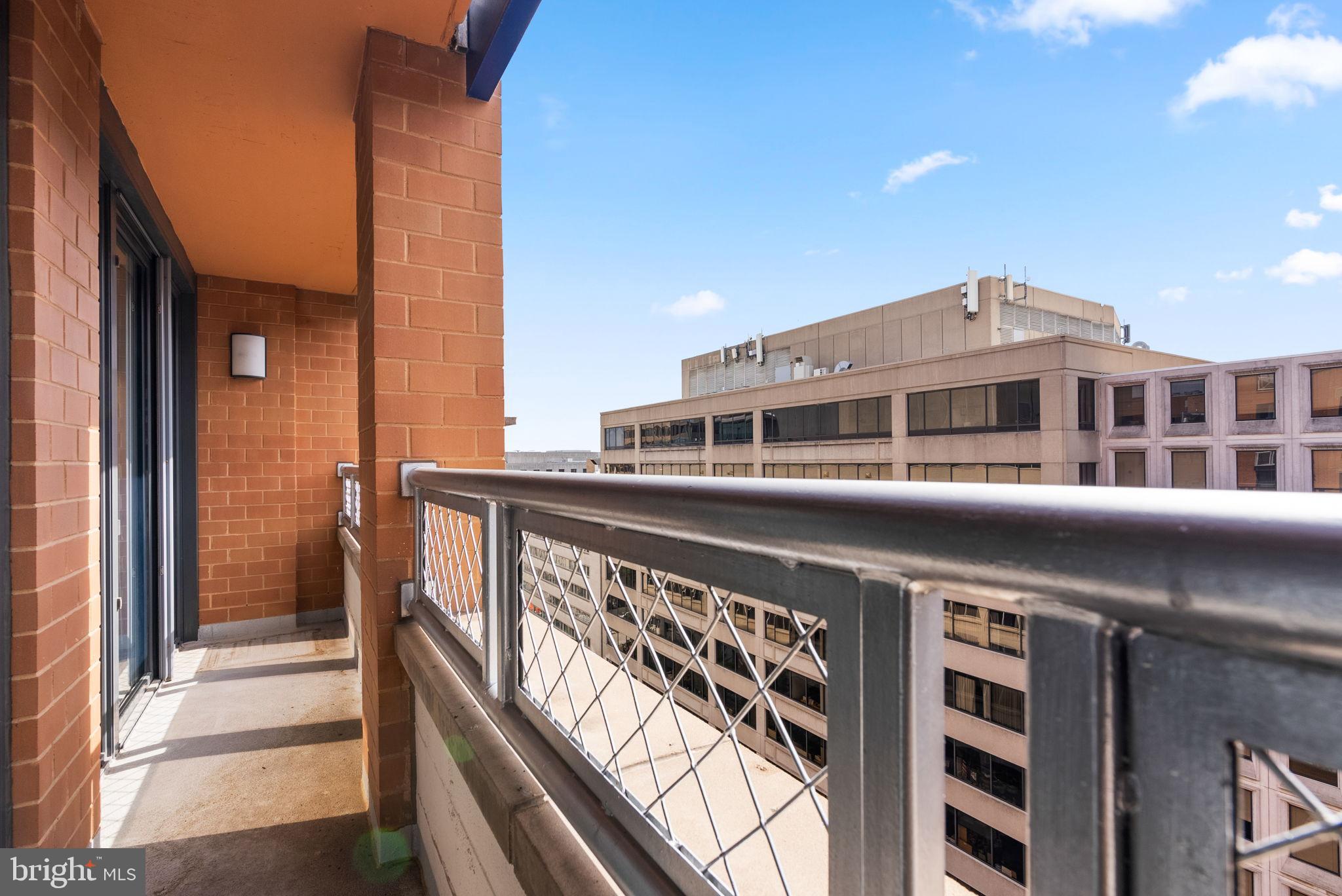 631 D Street Northwest, Unit 1129 Washington, DC 20004 - Photo 27 of 36 Urban balcony with city skyline views.