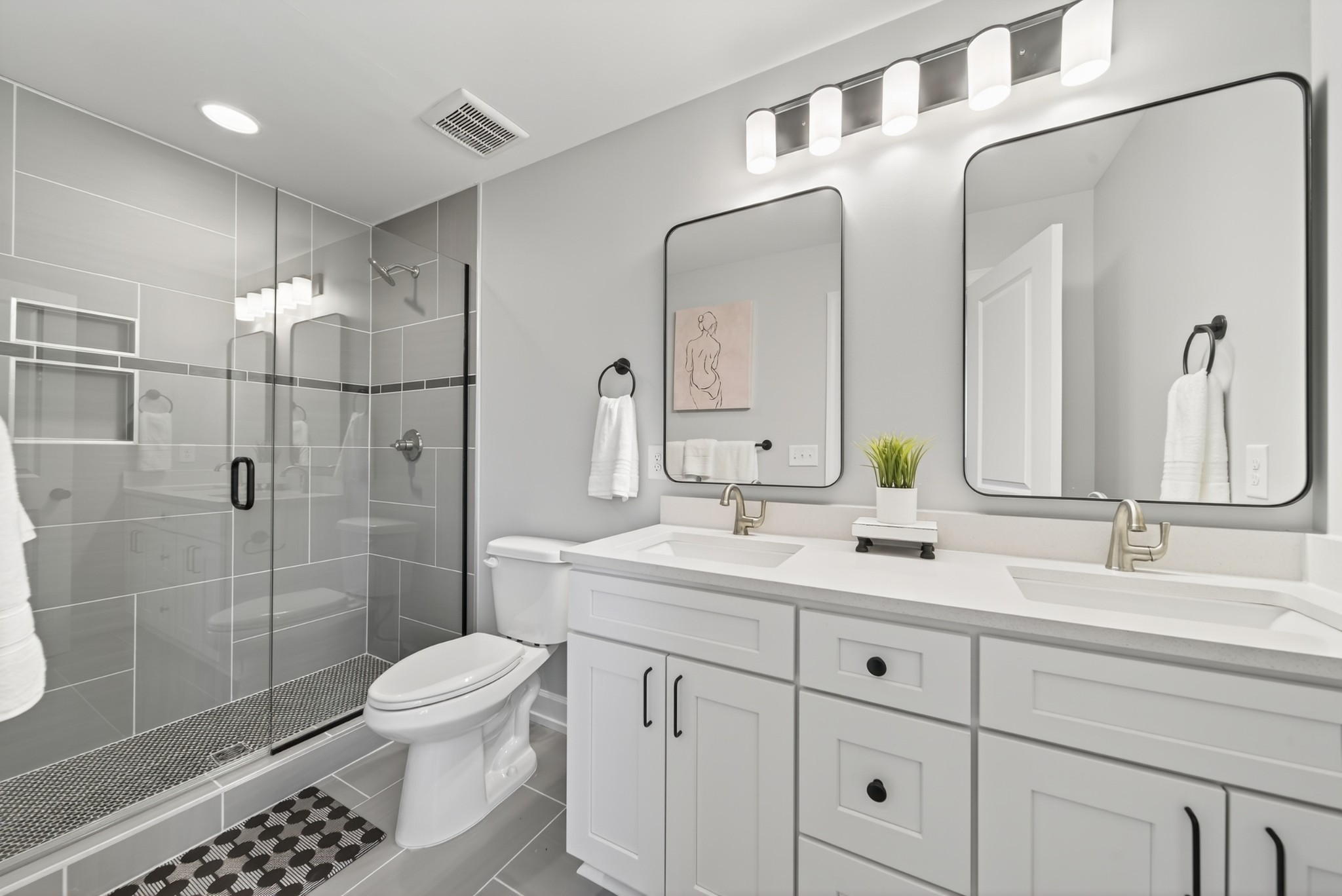116 Maple View Road Lebanon, TN 37087 - Photo 11 of 21 a bathroom with a double vanity sink toilet and shower
