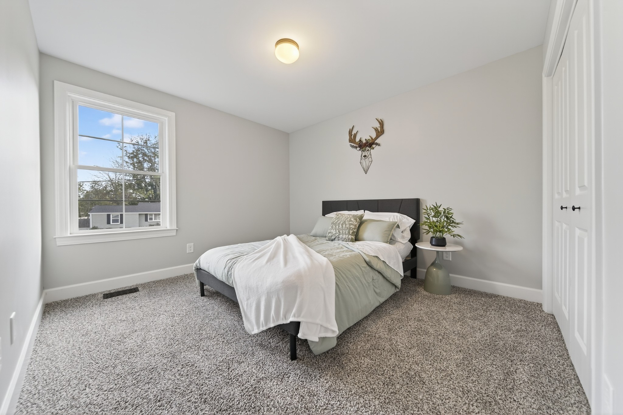 116 Maple View Road Lebanon, TN 37087 - Photo 14 of 21 a spacious bedroom with a bed and a window