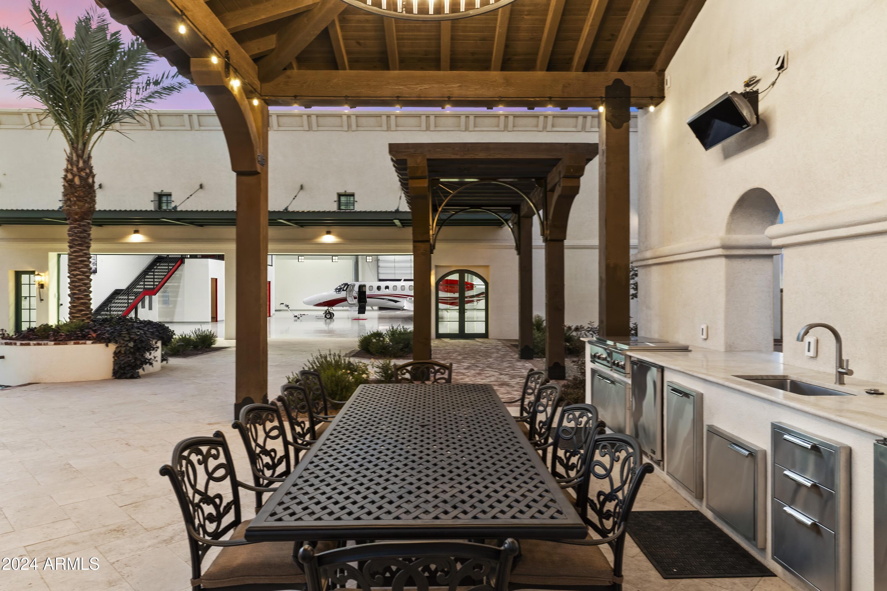 21868 East Stacey Road Queen Creek, AZ 85142 - Photo 103 of 146 a view of a dining room with furniture
