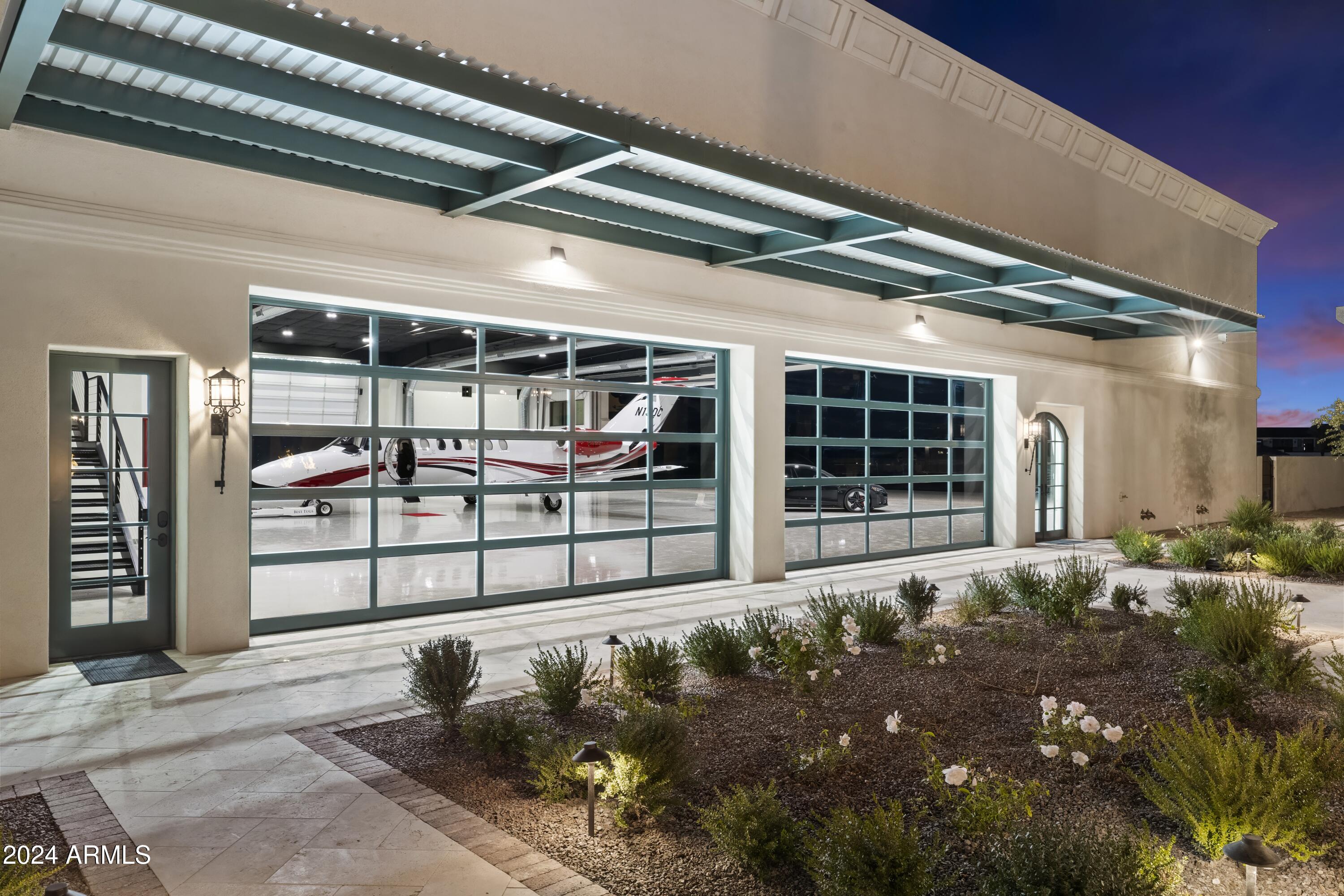 21868 East Stacey Road Queen Creek, AZ 85142 - Photo 112 of 146 a front view of a house with a garage