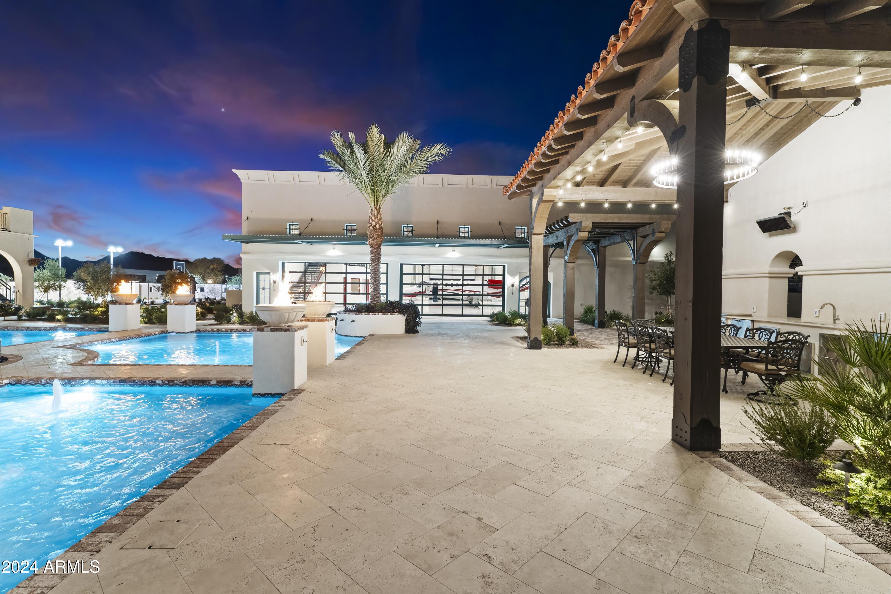 21868 East Stacey Road Queen Creek, AZ 85142 - Photo 128 of 155 a view of a swimming pool with a patio
