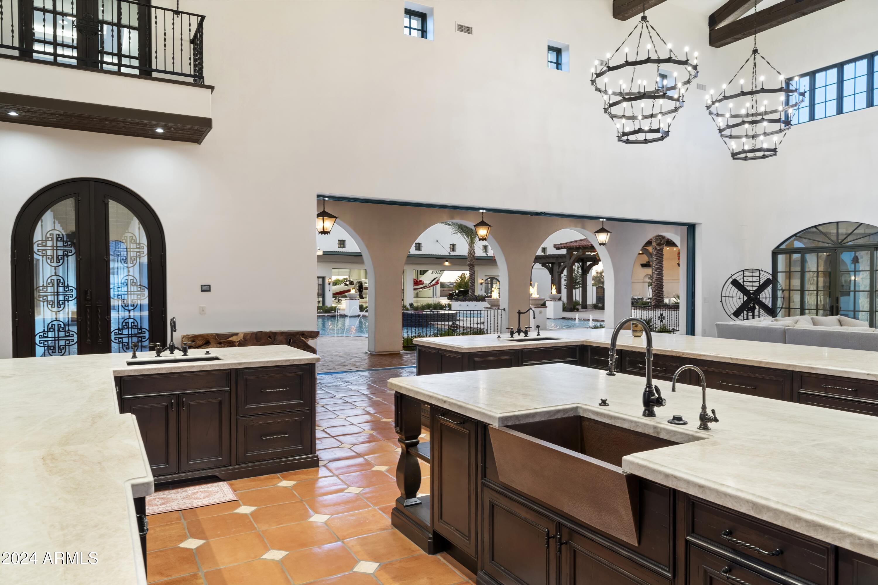 21868 East Stacey Road Queen Creek, AZ 85142 - Photo 17 of 155 a kitchen with stainless steel appliances granite countertop a sink and a stove