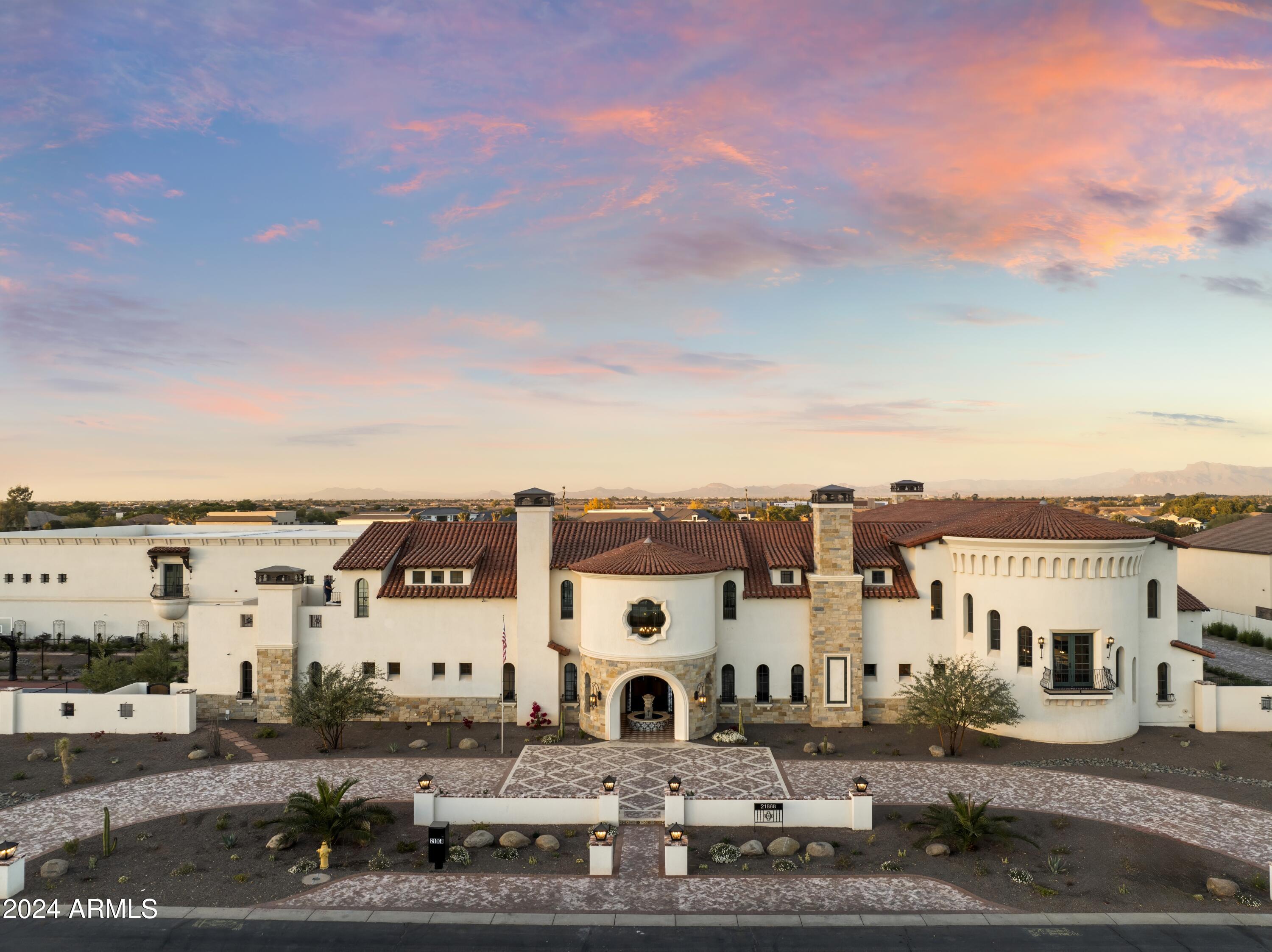 21868 East Stacey Road Queen Creek, AZ 85142 - Photo 2 of 155 a large white building with a view of city