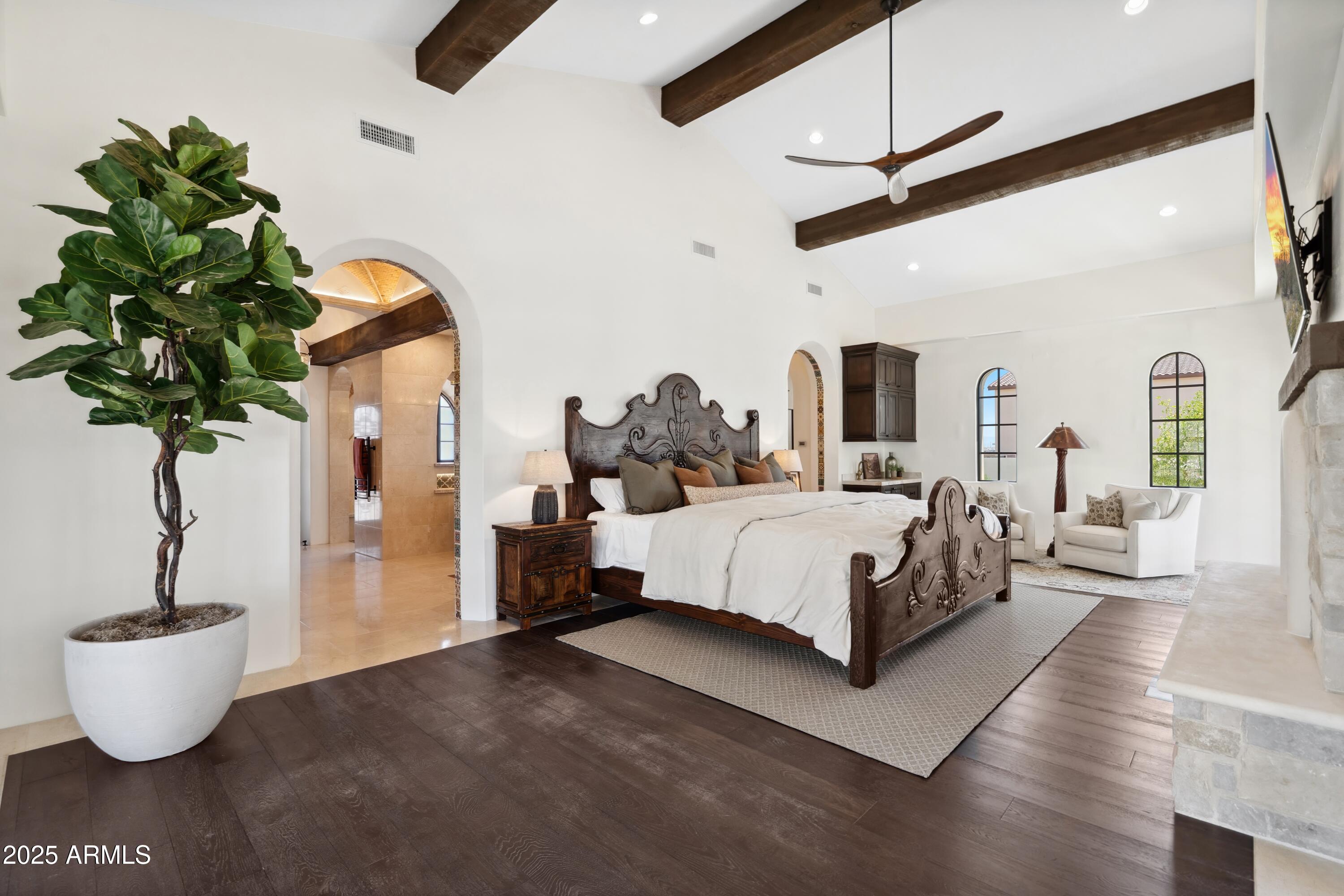 21868 East Stacey Road Queen Creek, AZ 85142 - Photo 63 of 155 a bed room with furniture and a potted plant