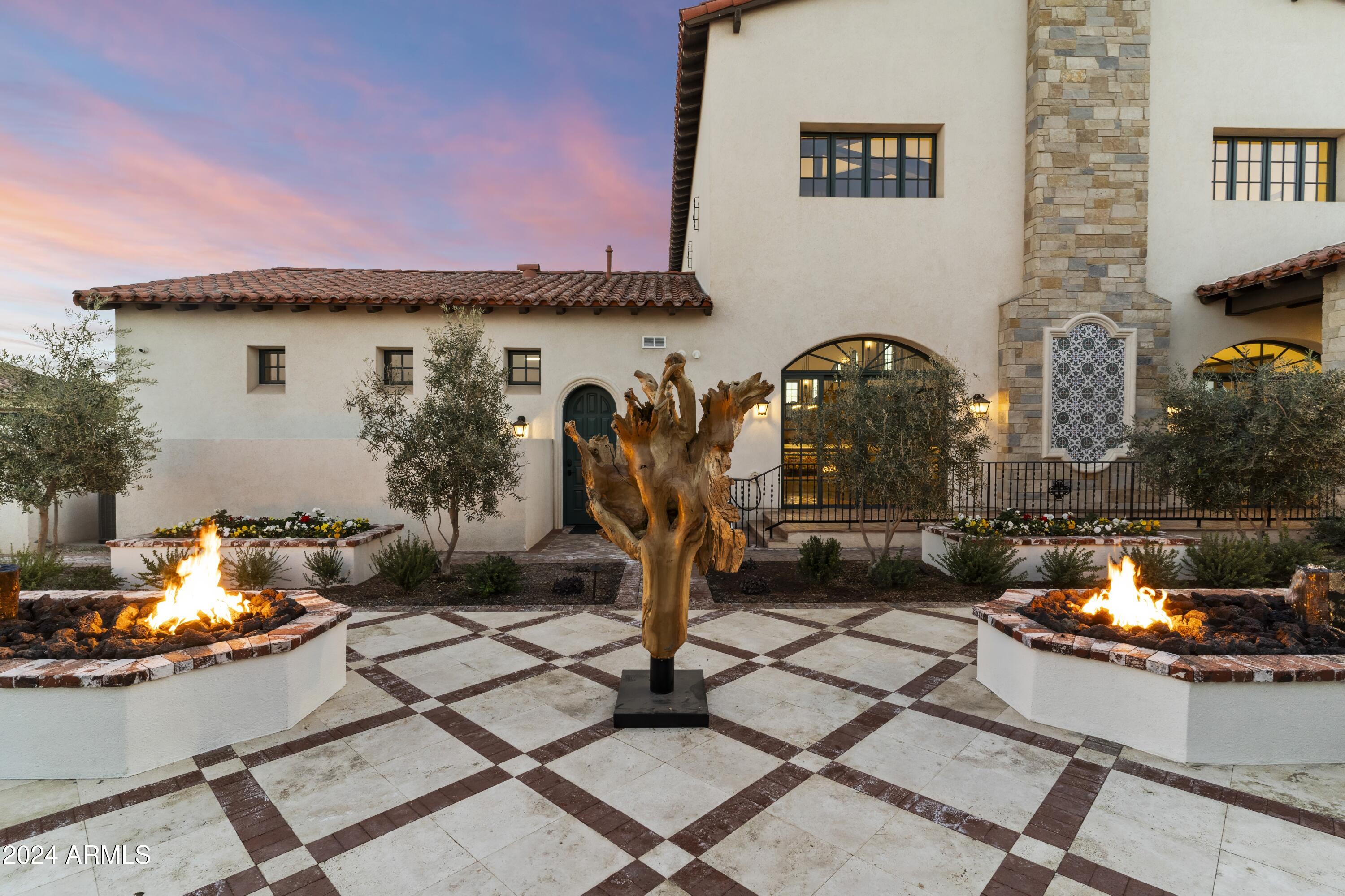 21868 East Stacey Road Queen Creek, AZ 85142 - Photo 84 of 146 a front view of a house with patio