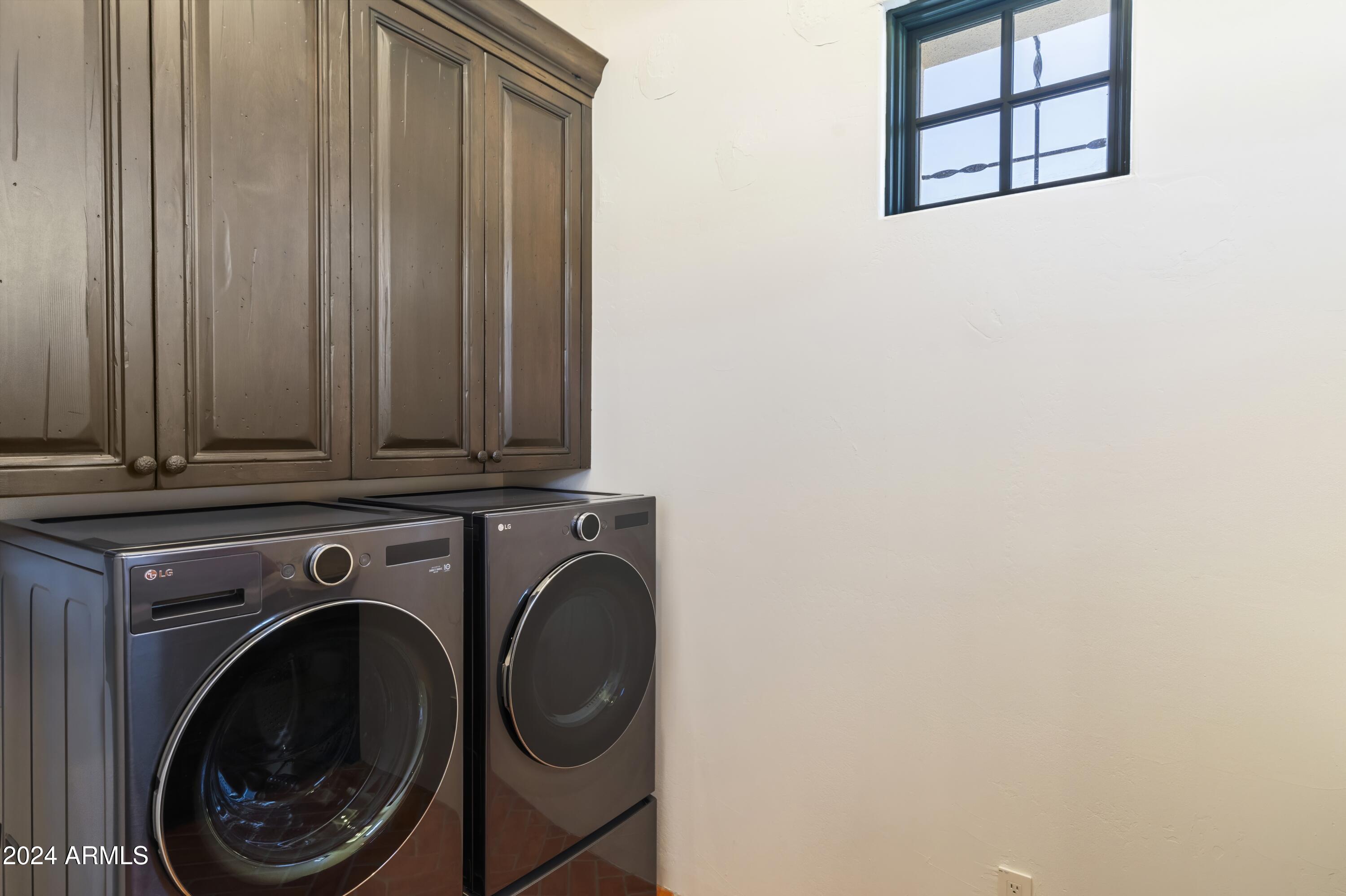 21868 East Stacey Road Queen Creek, AZ 85142 - Photo 76 of 155 a view of washer and dryer