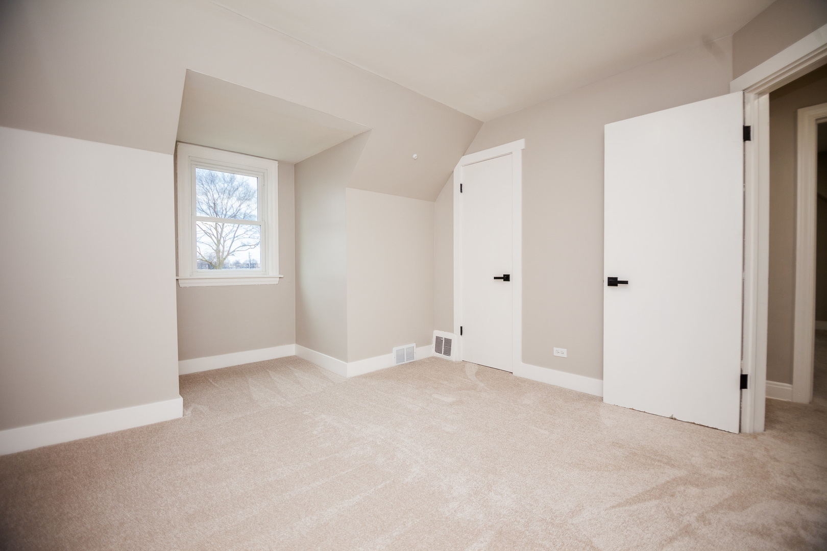 1156 West 102nd Street Chicago, IL 60643 - Photo 15 of 29 a view of an empty room with window and closet area