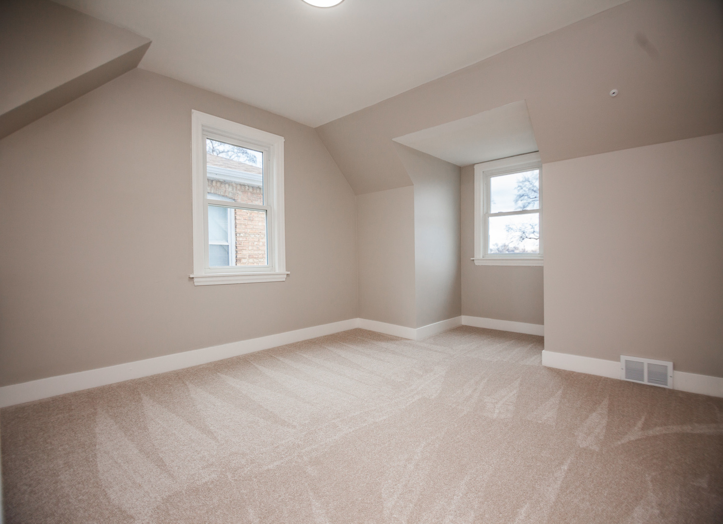1156 West 102nd Street Chicago, IL 60643 - Photo 17 of 29 an empty room with windows