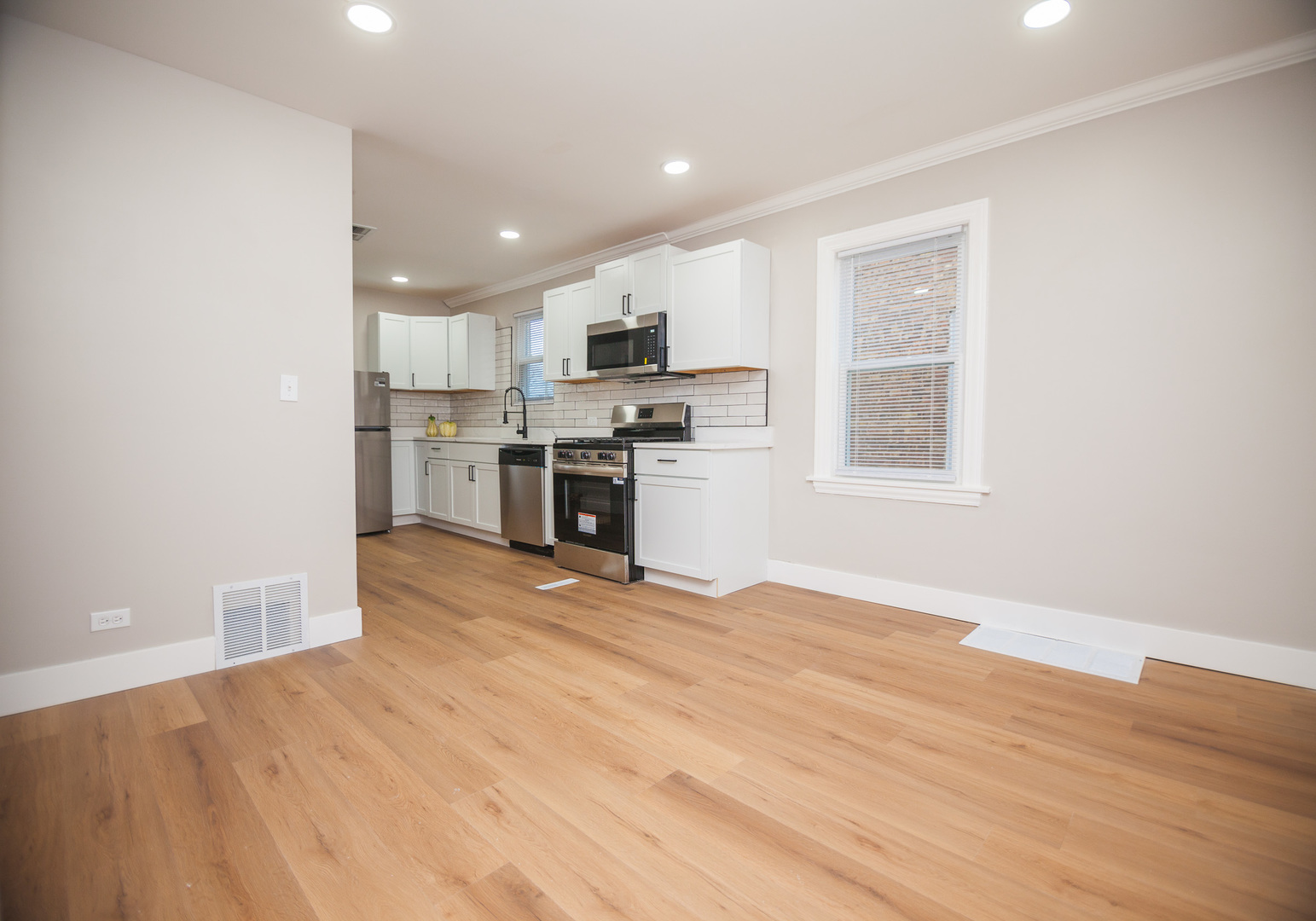 1156 West 102nd Street Chicago, IL 60643 - Photo 21 of 29 a view of kitchen with wooden floor and electronic appliances