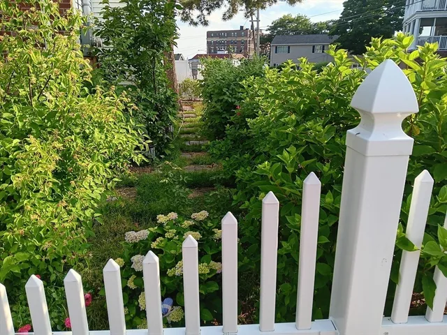 a view of a wooden floor with a swimming pool