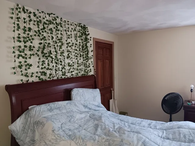 a bathroom with a toilet a sink and a shower