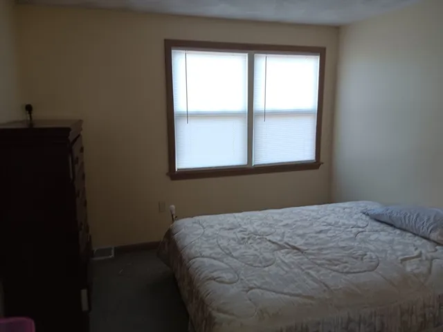 a view of a hallway with closet