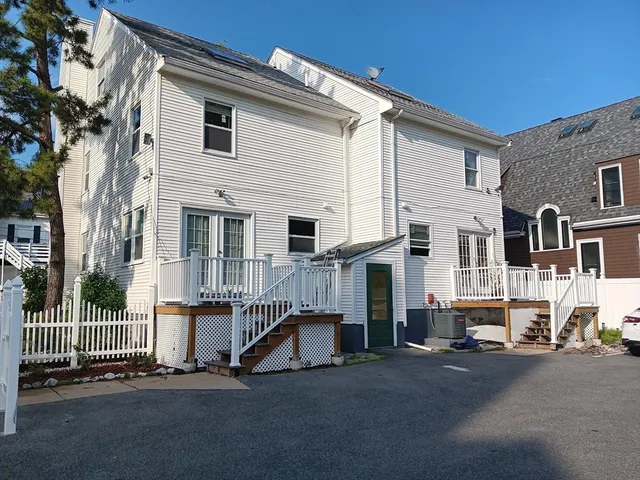a view of a house with a street