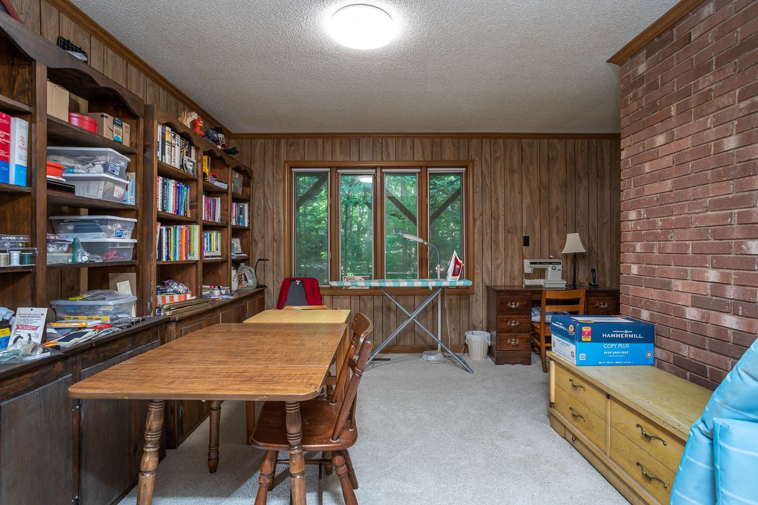 14401 Possum Track Road Raleigh, NC 27614 - Photo 17 of 30 Also on lower level, is a spacious area perfect for crafting, working, or hobbies! Basement