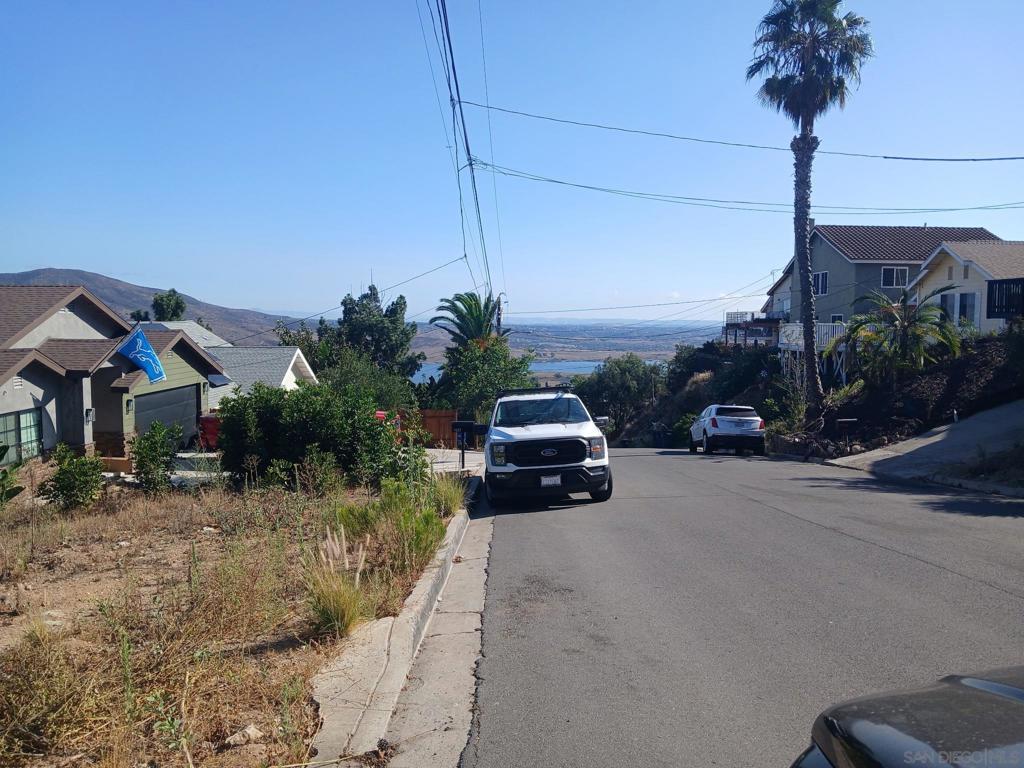 Undisclosed Address Spring Valley, CA 91977 - Photo 7 of 8 a car parked on the side of the road