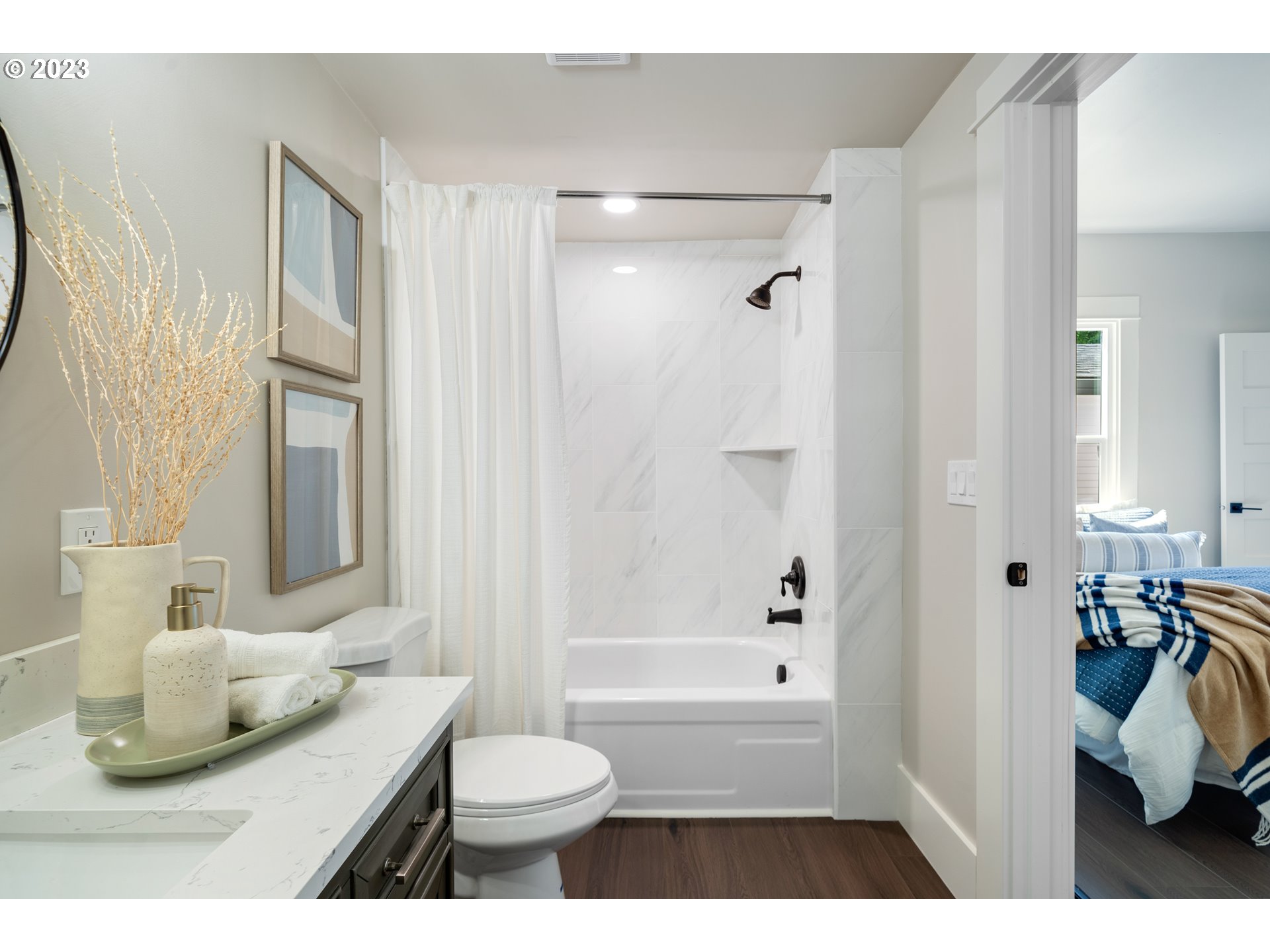 914 Northwest 7th Avenue Camas, WA 98607 - Photo 14 of 26 a bathroom with a sink toilet and shower
