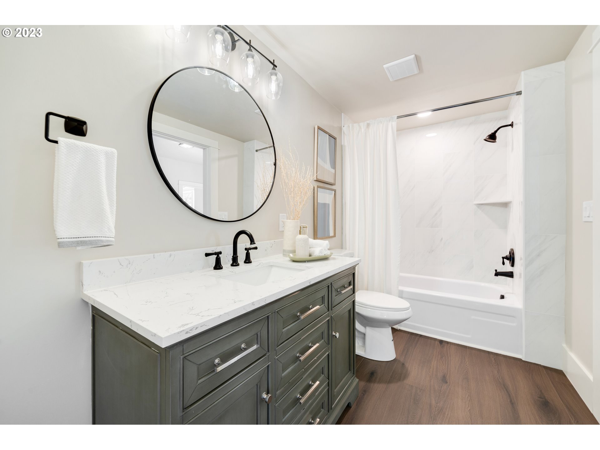 914 Northwest 7th Avenue Camas, WA 98607 - Photo 15 of 26 a bathroom with a sink a toilet and a mirror