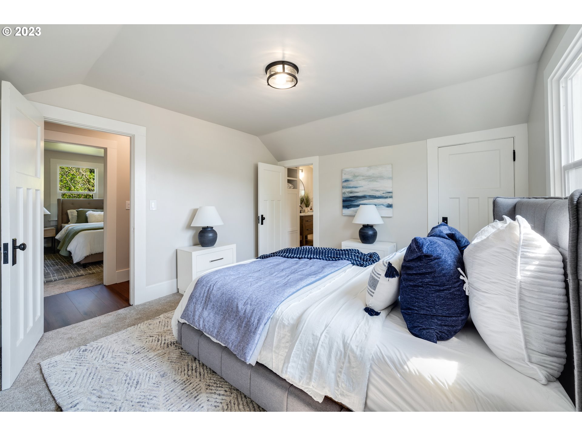 914 Northwest 7th Avenue Camas, WA 98607 - Photo 17 of 26 a bedroom with a bed and balcony