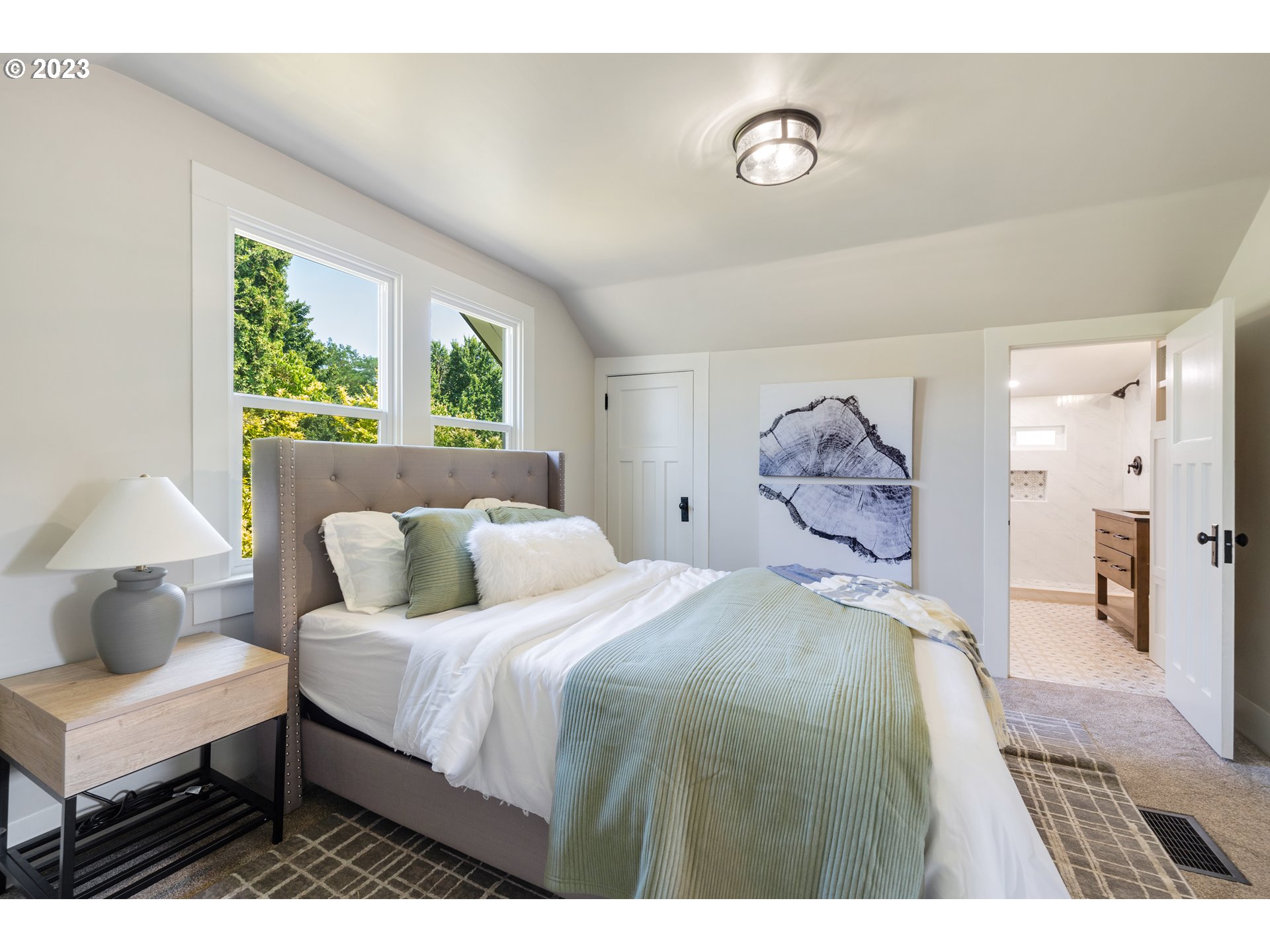 914 Northwest 7th Avenue Camas, WA 98607 - Photo 20 of 26 a bedroom with a bed and a window