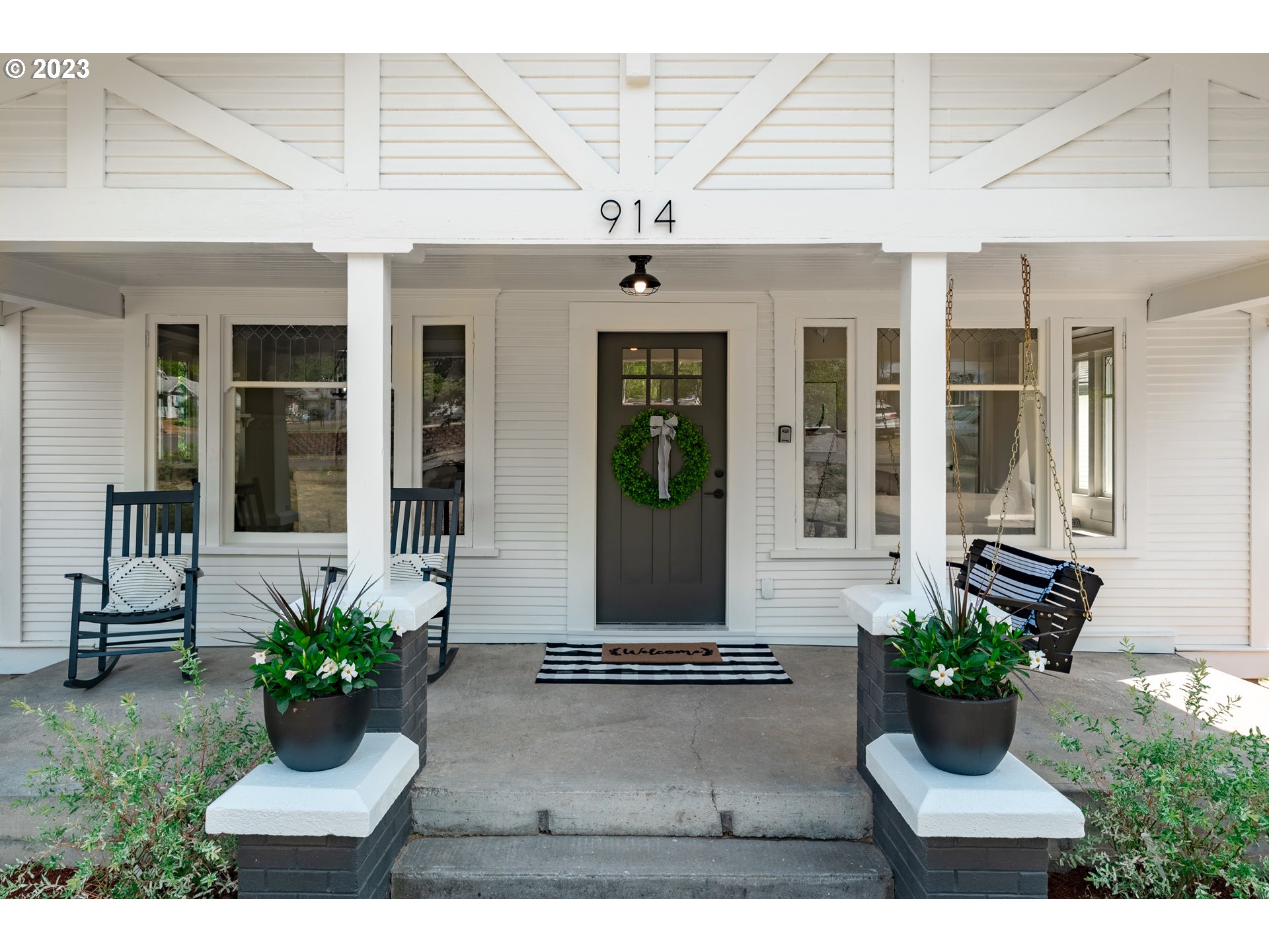 914 Northwest 7th Avenue Camas, WA 98607 - Photo 2 of 26 a view of a house with potted plants